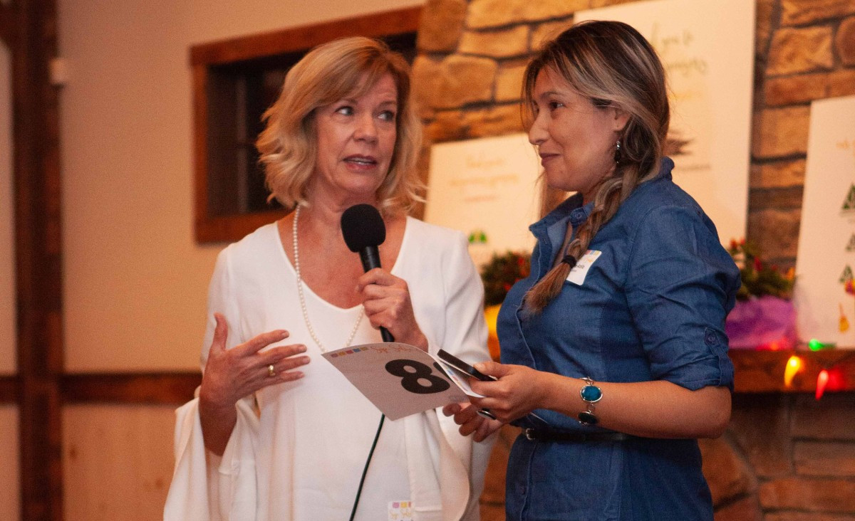 LitNet Tutor Sara Kiesel and her learner Carolina Ardila speak at the event