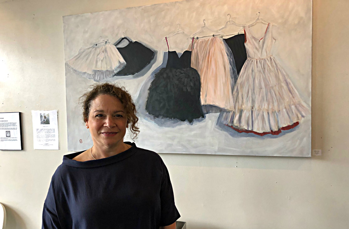 Joanie Ciolfi in front of her painting, "The Rehearsal." Joanie Ciolfi in front of her painting, "The Rehearsal."