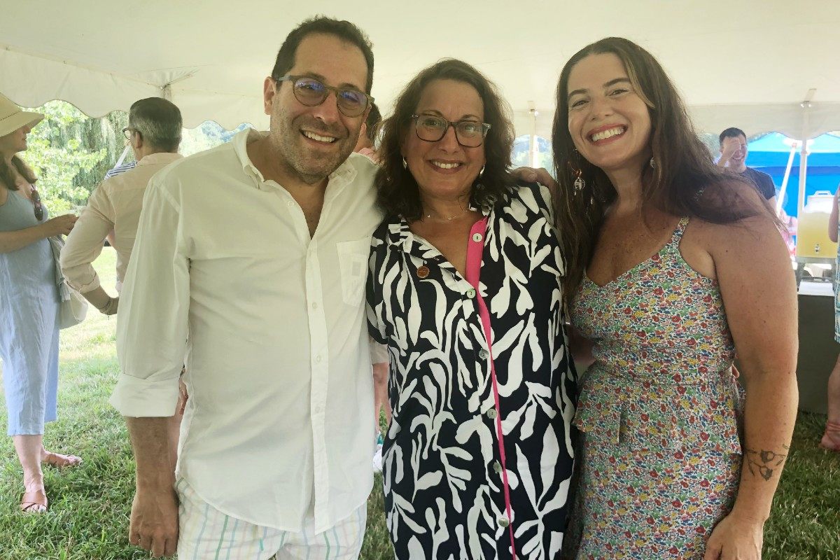 Jonathan Adelsberg, Executive Director Barbara Glassman, and Anita Sibony de Adelsberg, a board member at the Sylvia Center farm dinner