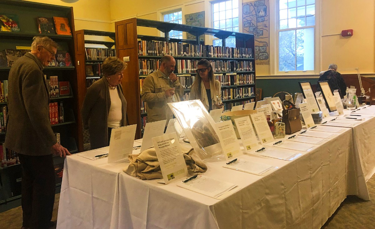 A silent auction among the books — what could be better? A silent auction among the books — what could be better?