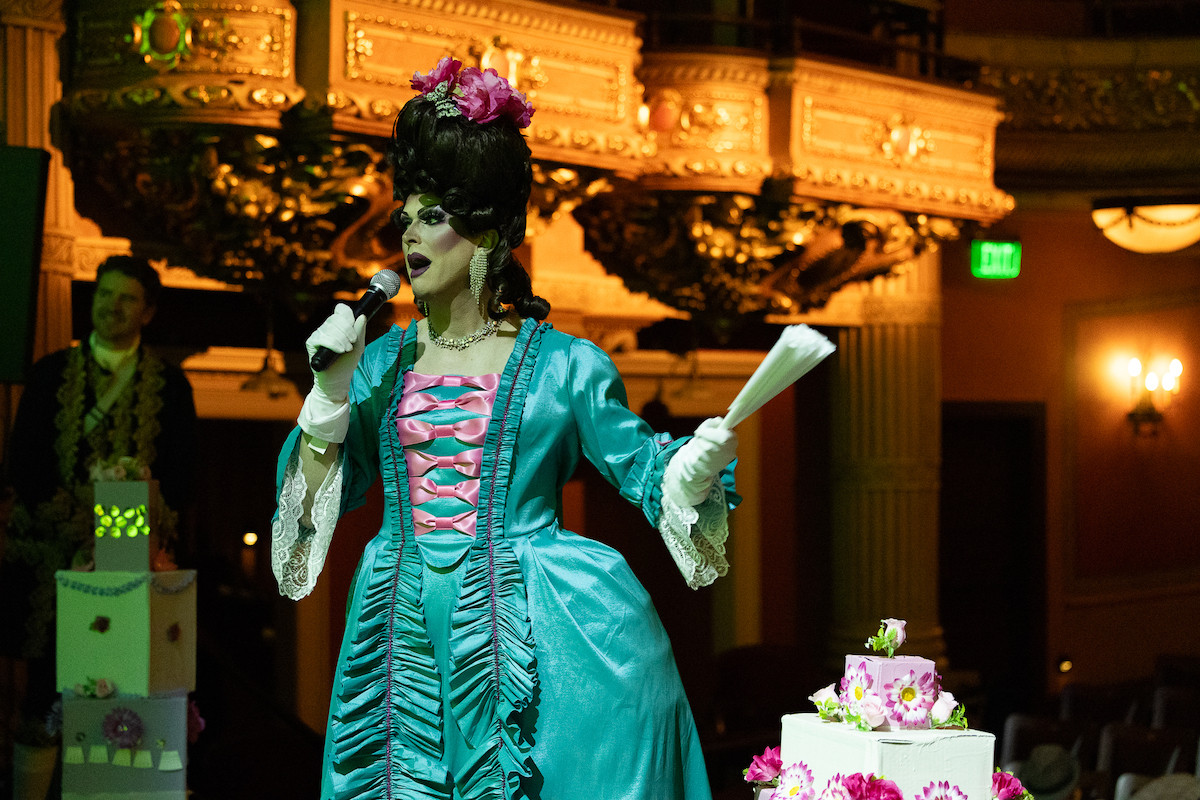 Drag performer&nbsp;Bella Santarella&nbsp;performs on stage at The Colonial Theatre.
