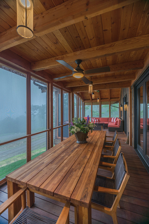 The screened and covered porches are intended to blur the line between interior and exterior spaces. The screened and covered porches are intended to blur the line between interior and exterior spaces.