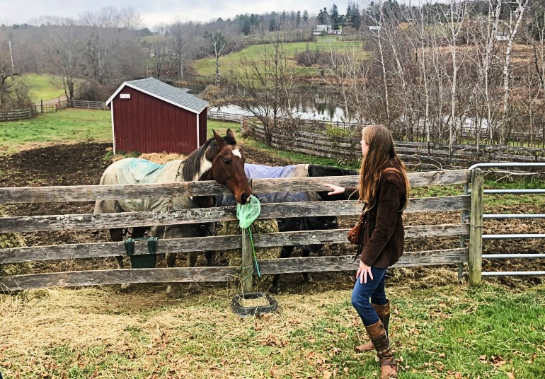 Susan Bandy introduces the group to two long-time residents.