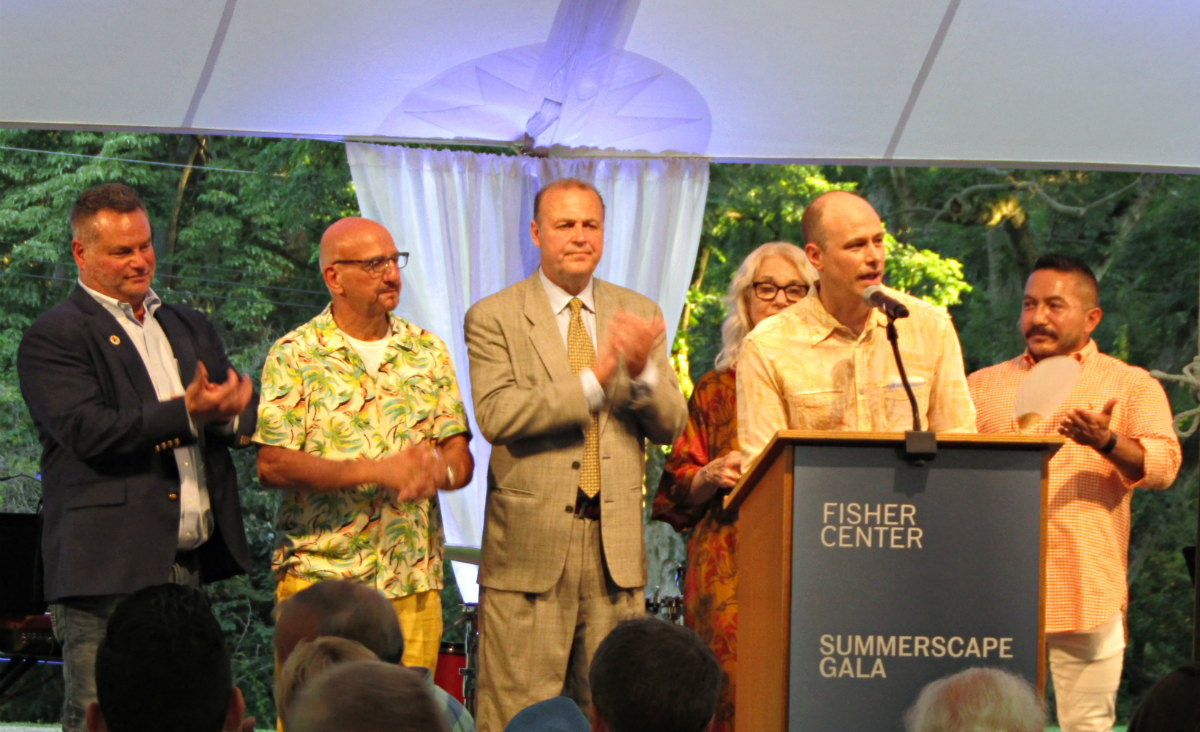 Bob Bursey addresses the crowd, in front of gala co-chairs&nbsp;Andrew Zobler, Tony Napoli, Stefano Ferrari, Carolyn Marks Blackwood and Manny Urquiza