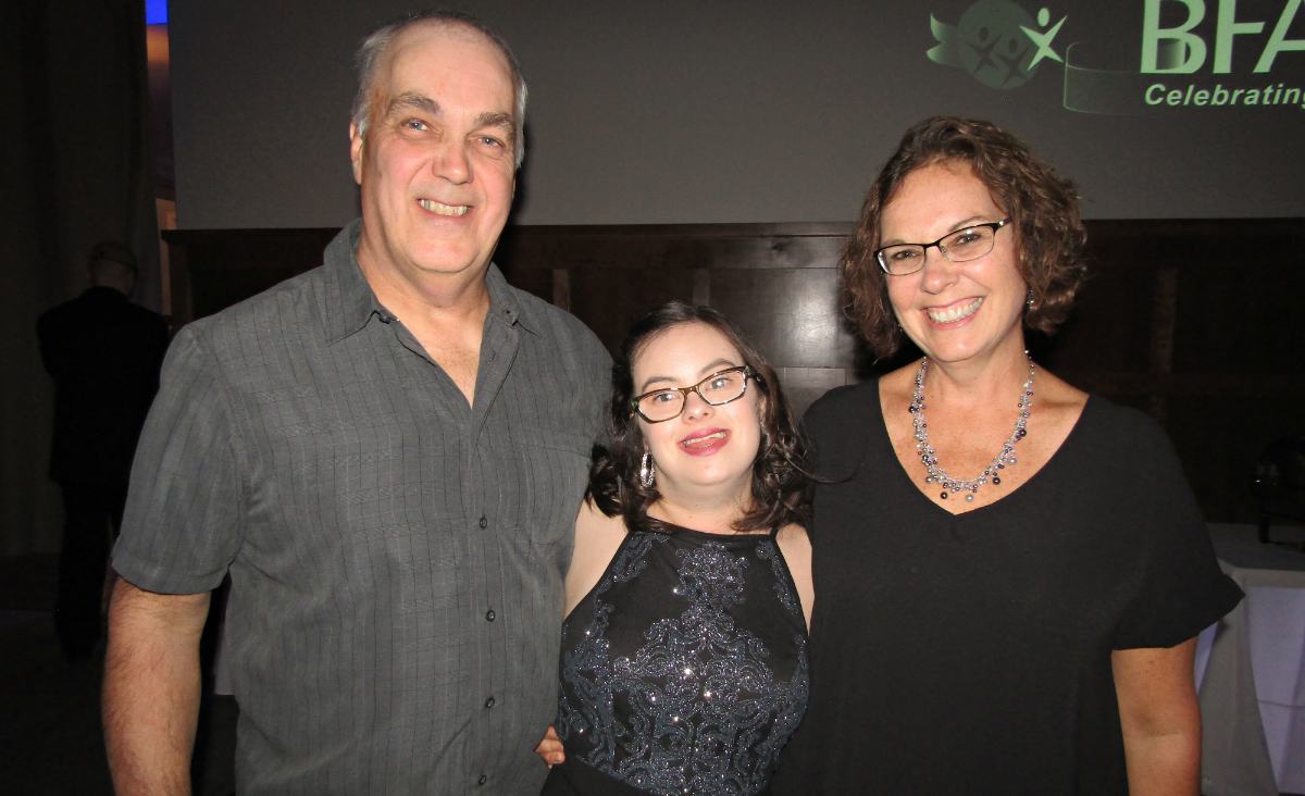 Dan and Pam&nbsp;Dorwin flank&nbsp;Brittany Dorwin, who spoke at the event.