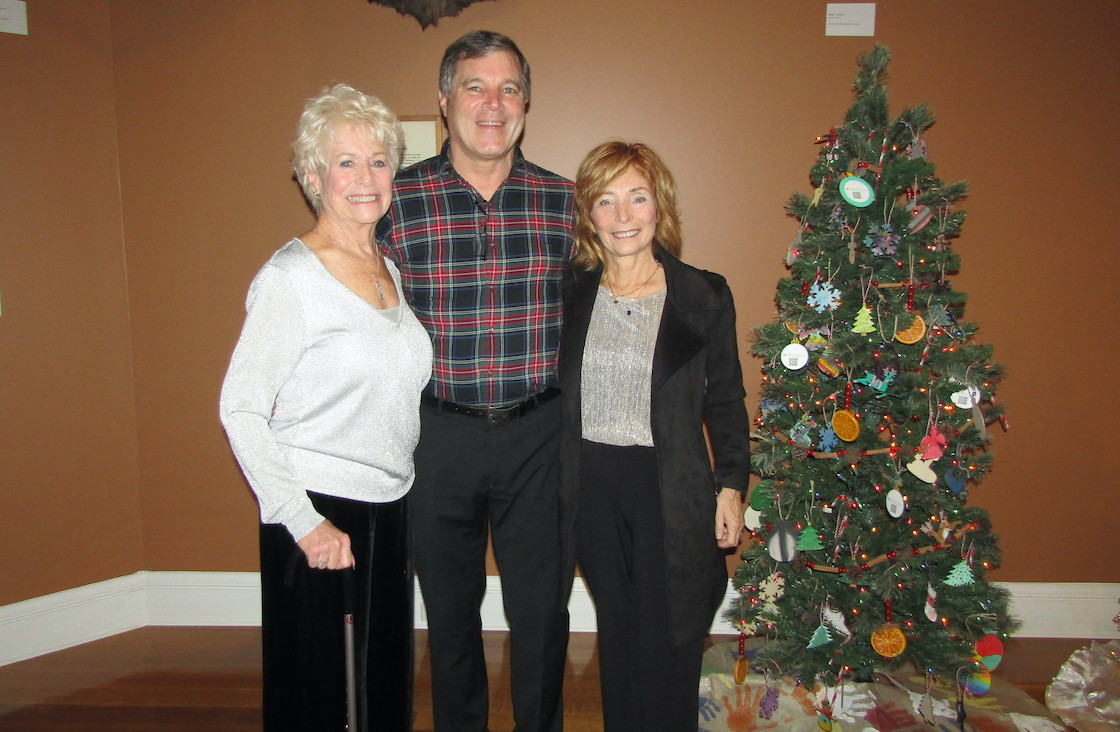 Lois Scalise, Jay Dube, and Tonia Scalise are longtime Festival of Trees supporters.