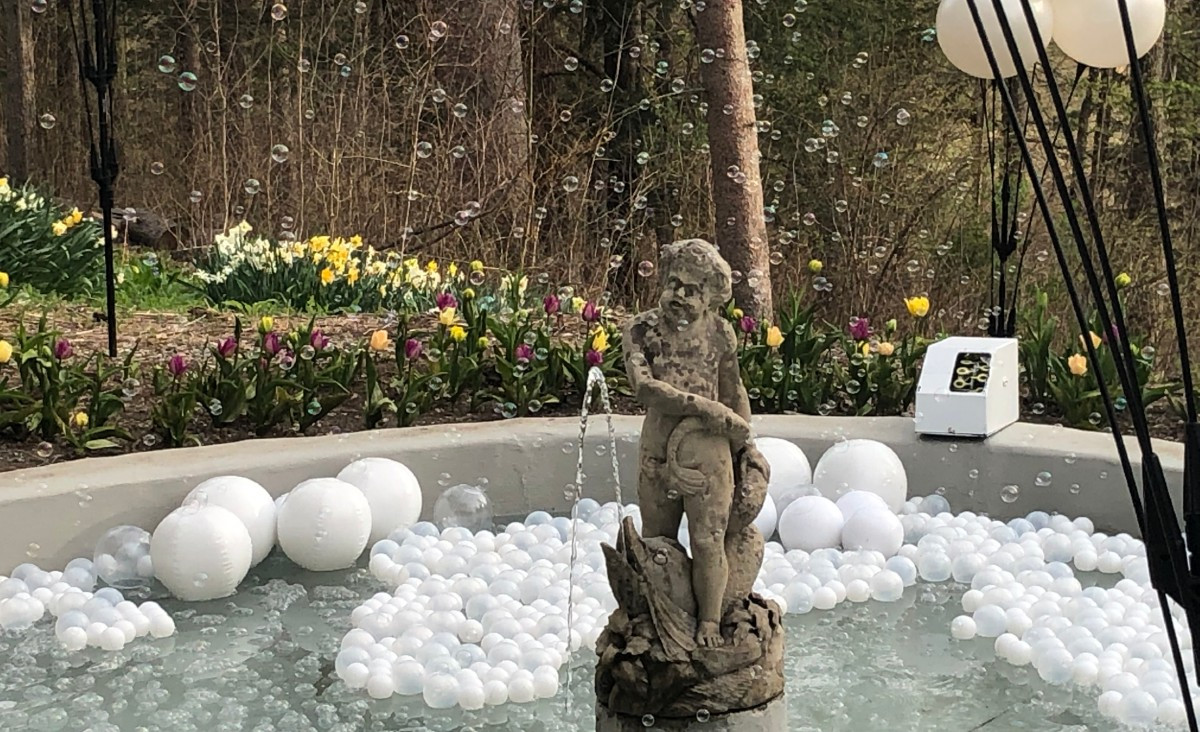 A bubbling fountain along the South Lawn path