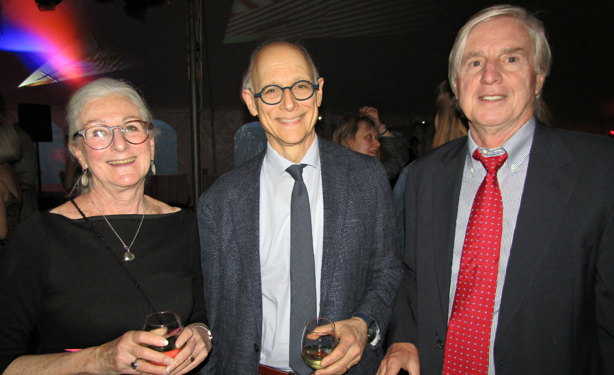 Gala committee members Julie and David McCarthy flank poet&nbsp;Owen Lewis