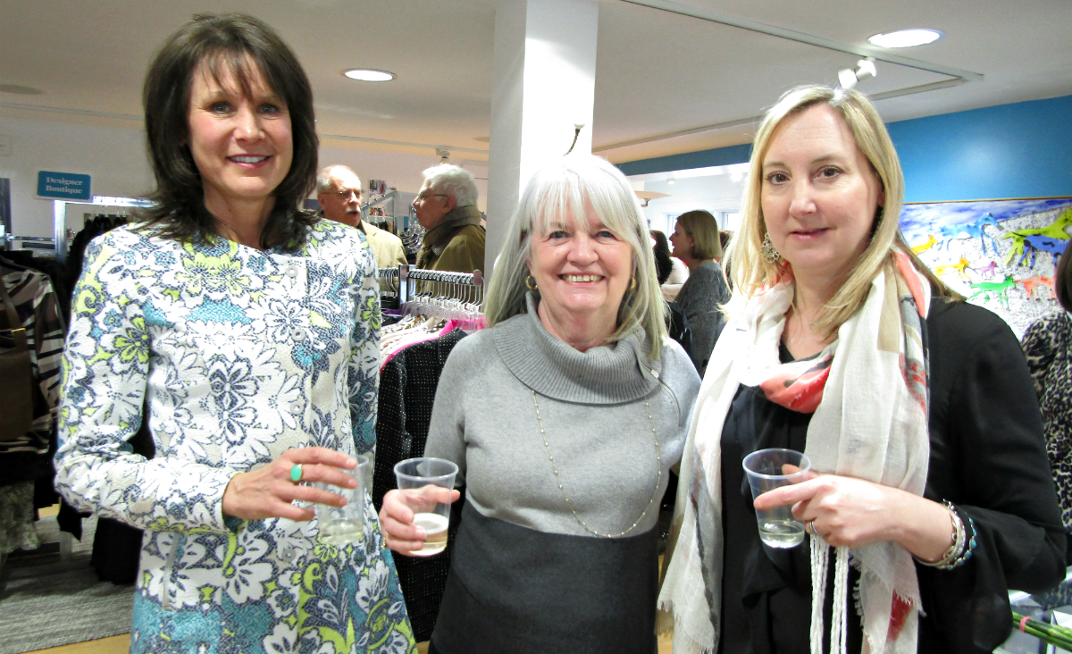 Board members Diana Wall and Victoria May flank volunteer KK McNutt