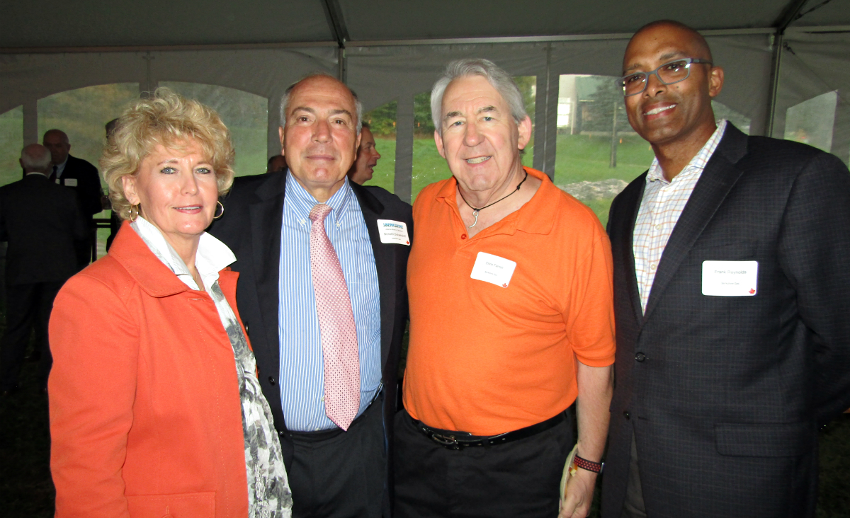 Lisa Dubendorf and 1Berkshire board member Donald Dubendorf with Chris Farrell and Frank Reynolds, president of Berkshire Gas