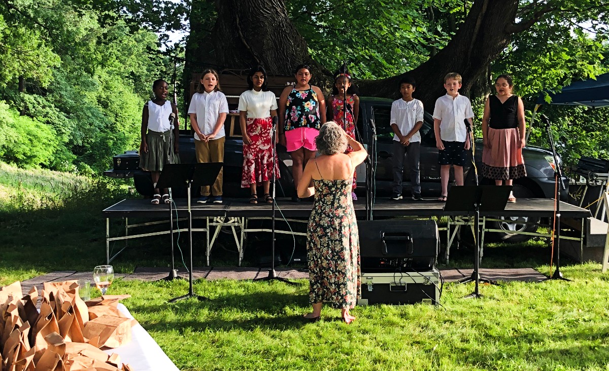 Children from the Harmony Project perform two selections from "River of Dreams."