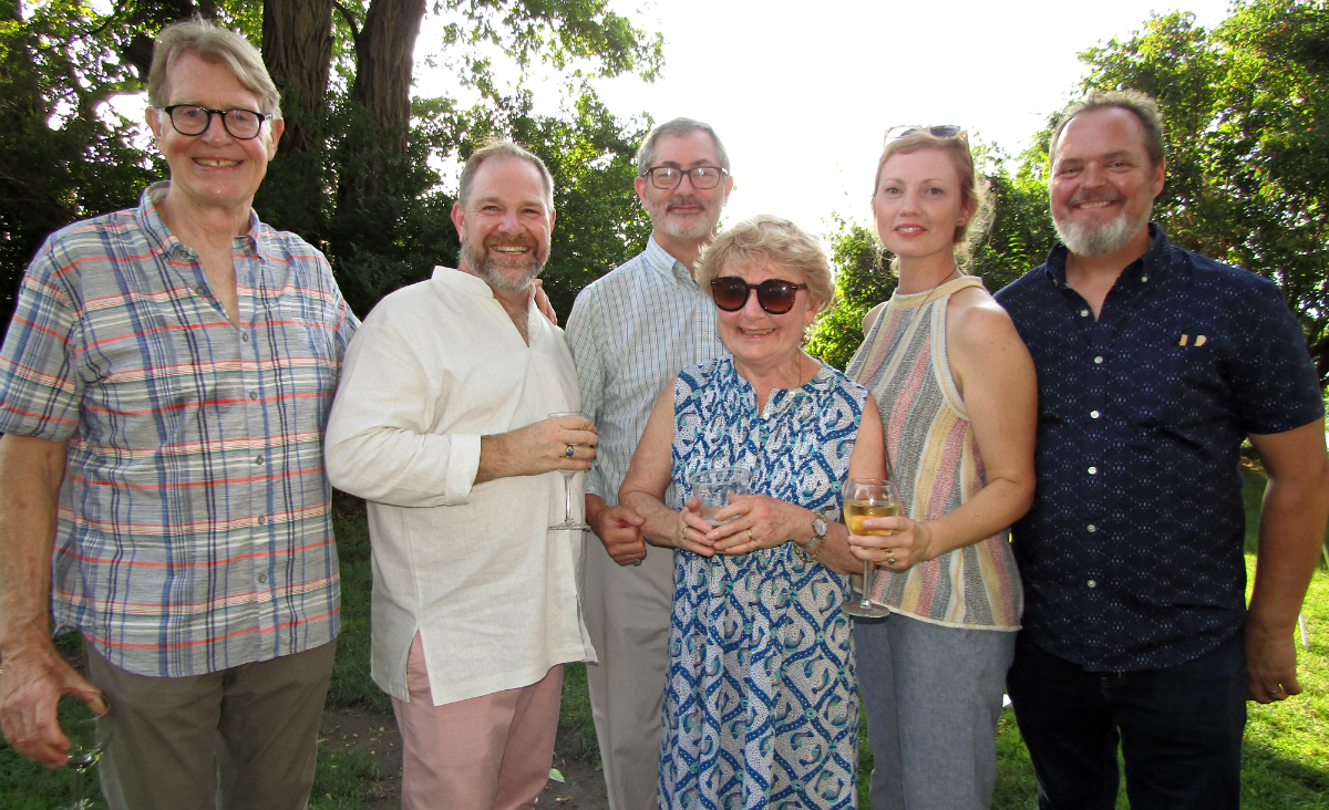 Vern Bergelin, Matthew Kenny, Kirk Hochstetler, board vice president Mary Ellen Ross, and Kate and Seamus Quigley