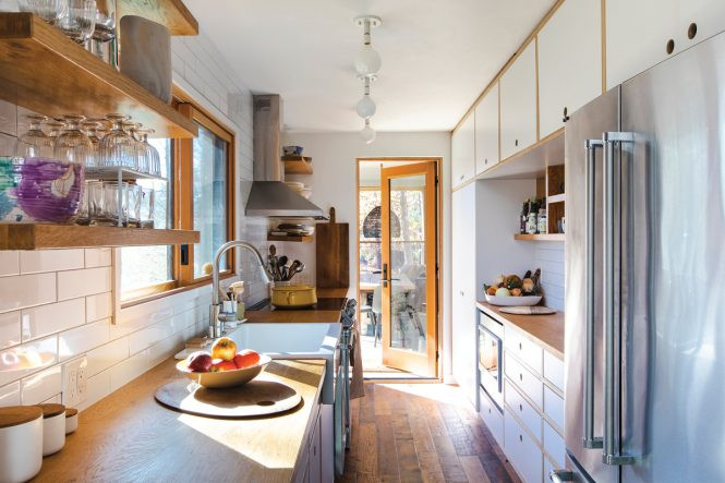 The width of the kitchen was determined by the size of a shipping container, so Cornillon opted for a galley kitchen.