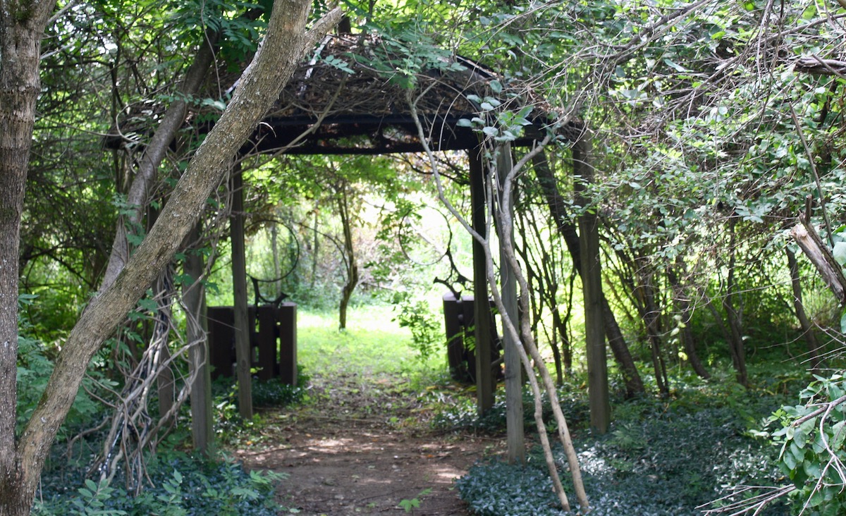 A hidden gazebo made from a giant old satellite&nbsp;dish.