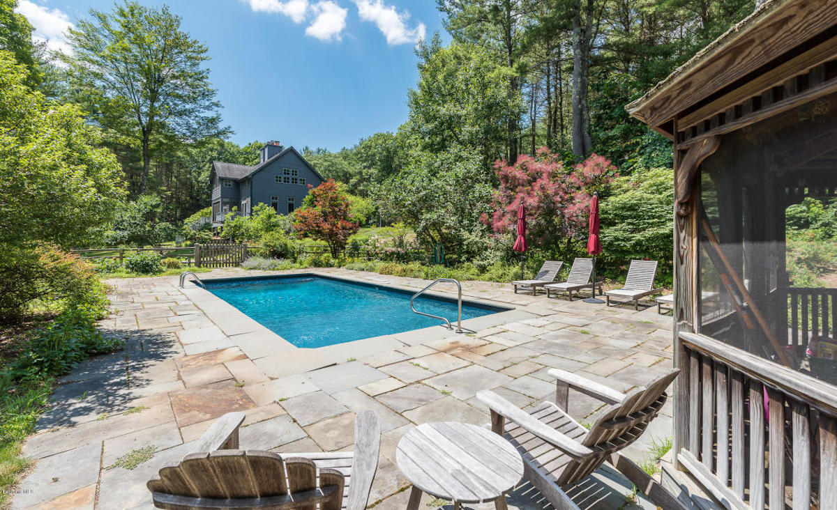 Park-like grounds with pool