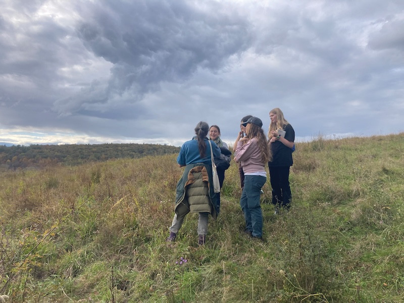 Ecology Club Students and members of Farmscape Ecology Program surveying biodiversity trail site