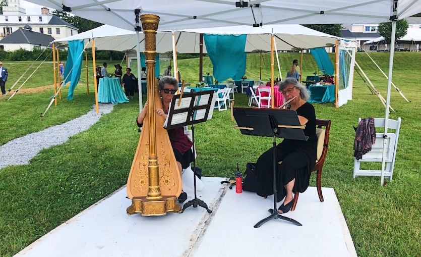 Harpist Carol Emanuel and flutist Sharon Powers provided music at the reception.