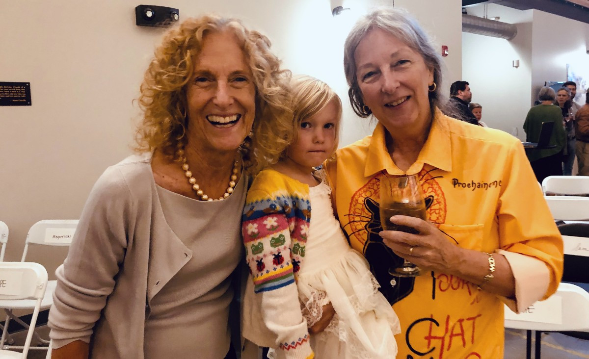 American Mural Project Founder Ellen Griesedieck with Sandra Boynton, cartoonist and songwriter, and her granddaughter, Remy