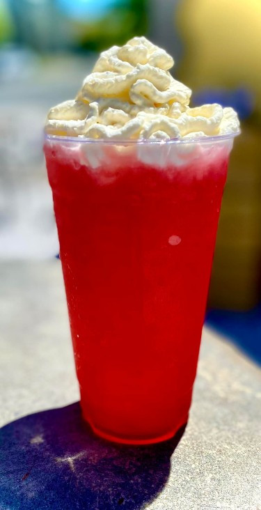 Hibiscus iced tea with maple syrup,&nbsp;ginger, and&nbsp;lemon. With optional whipped cream. - Courtesy Flying Church Coffee