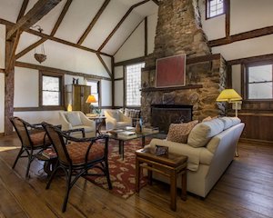 Living room with stone fireplace