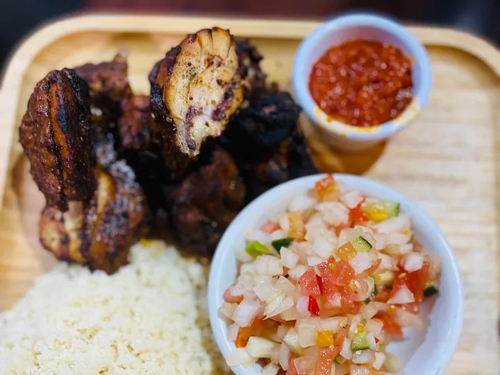 Choukouya de poulet — African-style jerk chicken marinated with special seasoning Choukouya de poulet — African-style jerk chicken marinated with special seasoning