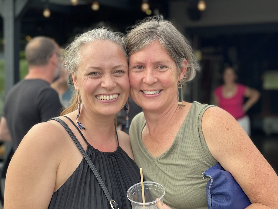 Julie Webster and Sarah Reynolds North, both FCI parents