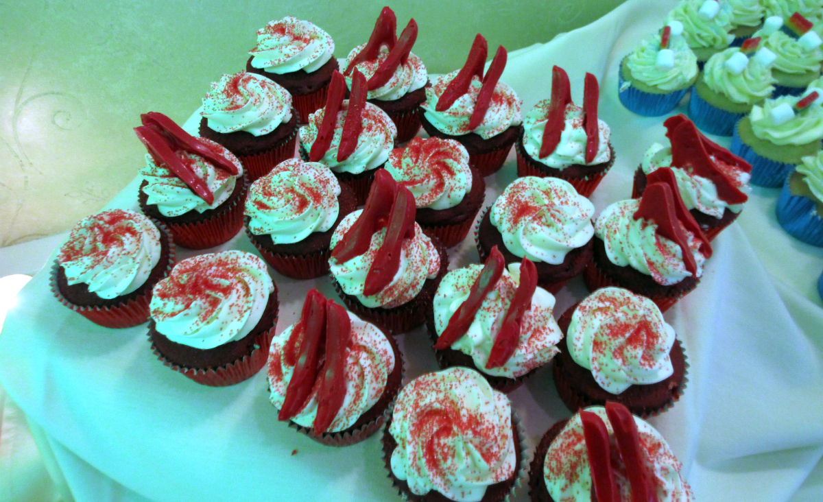 Edible ruby slippers top cupcakes by Smylee Rylee Edible ruby slippers top cupcakes by Smylee Rylee