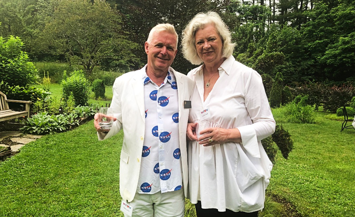Matt Larkin, chair of the Trustees, sporting a NASA-print shirt, and Lainie Grant