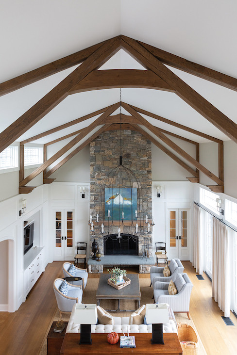 Wide-open spaces, as evidenced in the great room’s soaring ceiling and wall of windows, carry through the entire ground floor and allow for sweeping views south — all the way to Great Barrington. Wide-open spaces, as evidenced in the great room’s soaring ceiling and wall of windows, carry through the entire ground floor and allow for sweeping views south — all the way to Great Barrington.