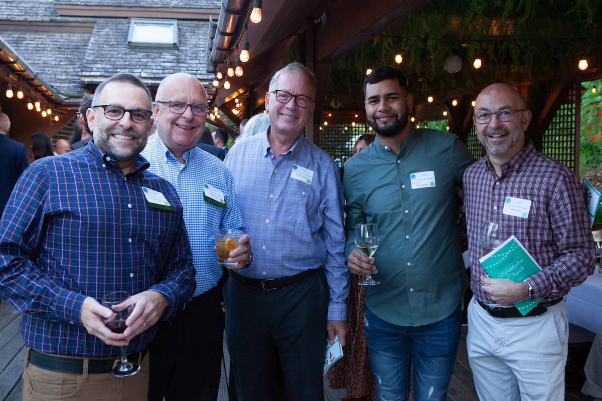 David Goldenberg and Marc Hurel, both LitNet volunteer tutors; Steven Perry, Carlos Sanchez, a LitNet English language learner, and Jeff Knam David Goldenberg and Marc Hurel, both LitNet volunteer tutors; Steven Perry, Carlos Sanchez, a LitNet English language learner, and Jeff Knam