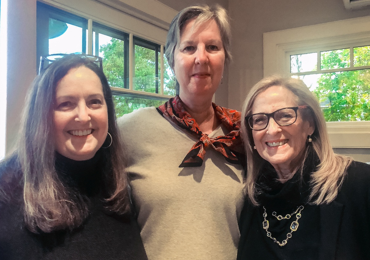 Liz DeMarco of BookMarc Creative, Carolyn Butler, a WAM board member, and Ellen Ring