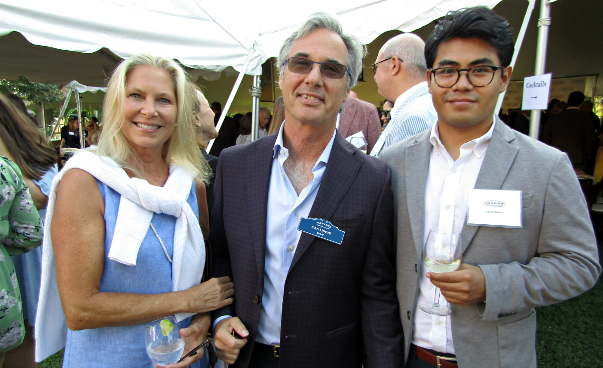 Sue Lipson and board member Dan Lipson with David Mateos