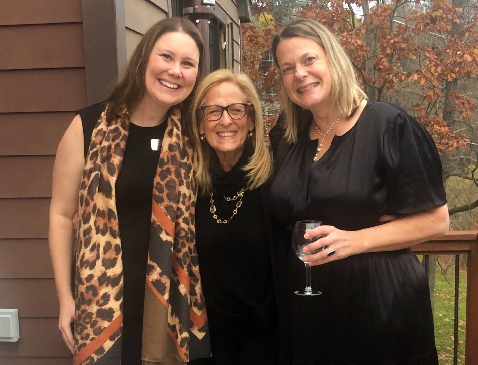 WAM Executive Director Molly Merrihew, Ellen Ring, a former board member, and Kristen van Ginhoven