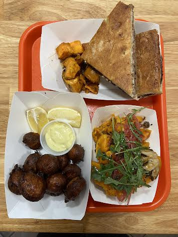 Meatloaf sandwich, fish fritters and salad