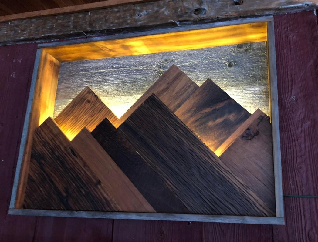 Troy Brown created an illuminated landscape out of excess wood pieces. - Rustic Gardens