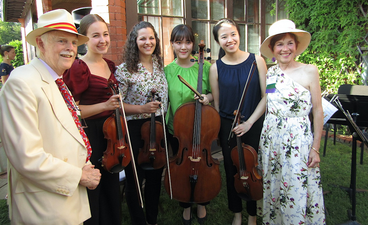 The evening&#39;s honorees, Nathan and Marilyn Hayward, flank the Tanglewood musicians&nbsp;who performed as a surprise to honor the couple.