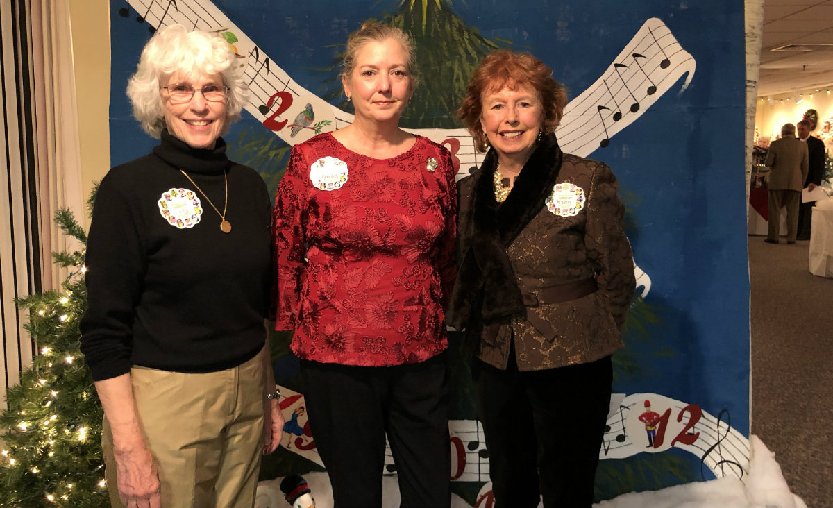 Judy McKernon, the Auxiliary&#39;s new president, with event co-chairs Meredith Dittmar and Karen Bennett