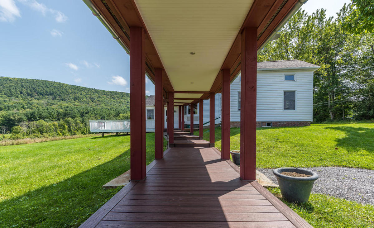 Covered walkway leading to farmhouse Covered walkway leading to farmhouse