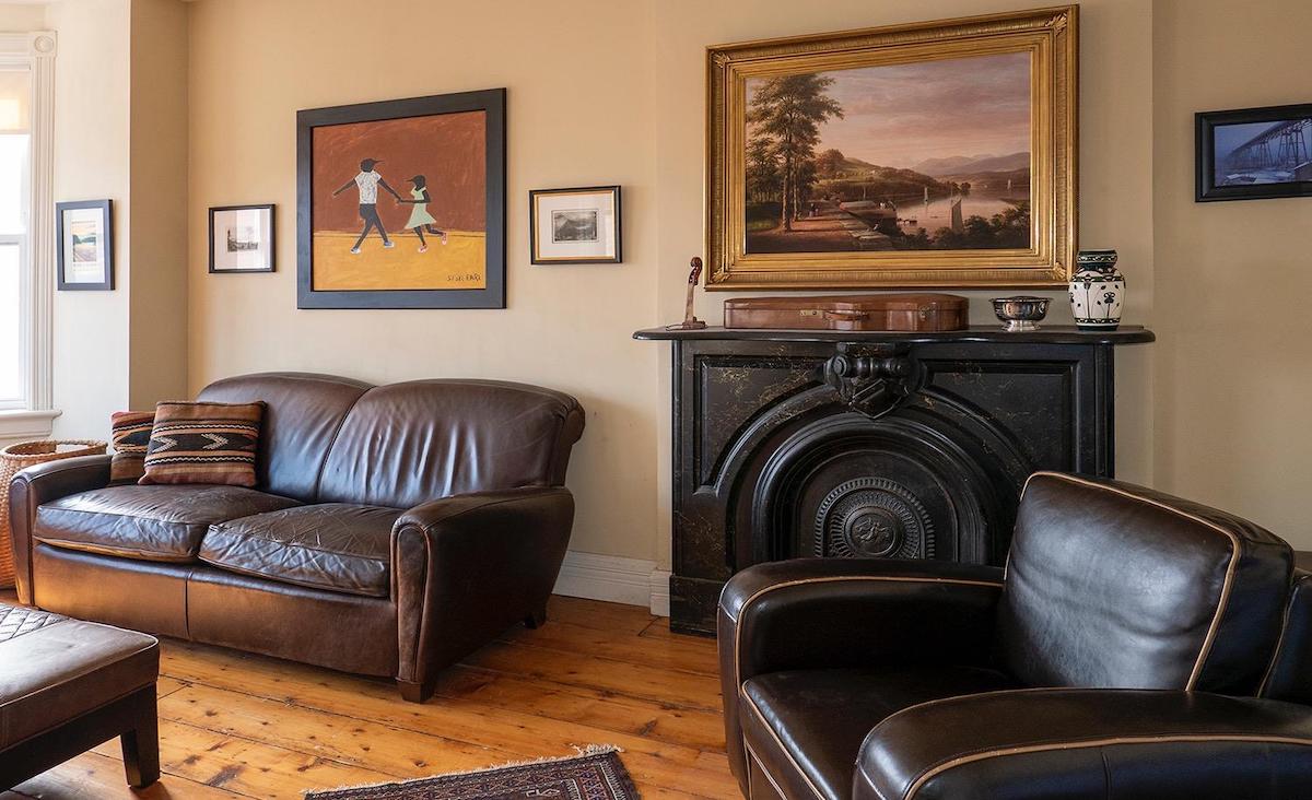 Third floor study/bedroom with original mantel