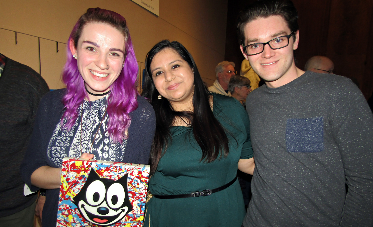 Alliey Pevay, who created a piece of art for the raffle, with&nbsp;Roshni Bhambhwani and Connor Brimmer