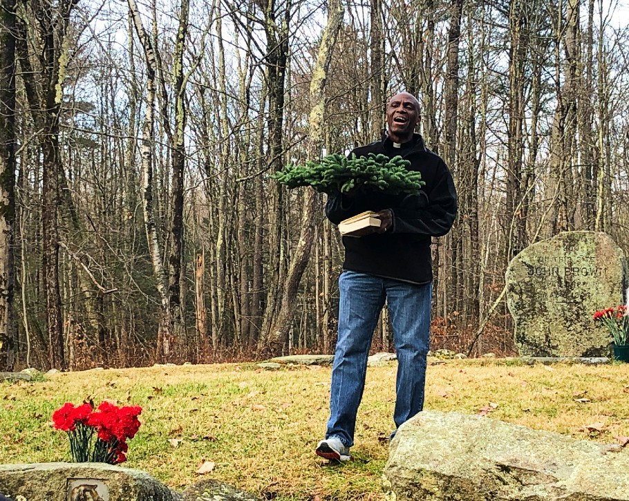 The Reverend Kevin Johnson leads the group in singing "This Little Light of Mine."