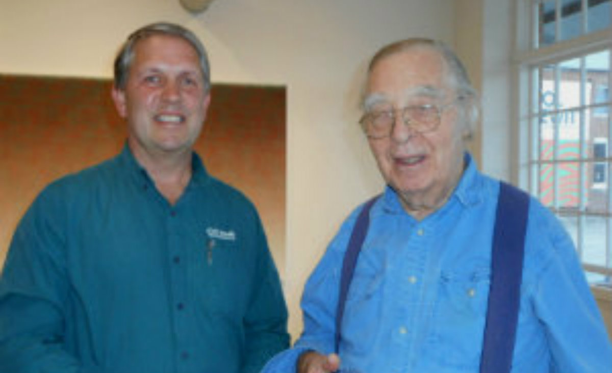 Greg Van Houten of GVH Studio, which supplies graphics to galleries and museums, with Jarvis Rockwell.