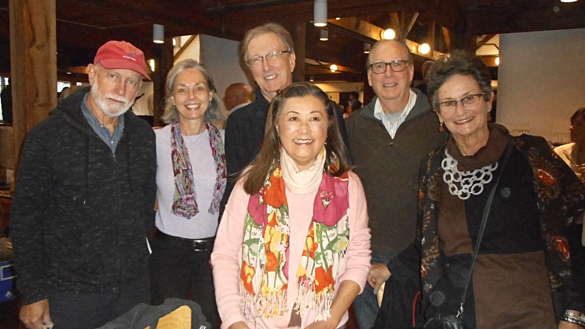 Friends gather at a table: Geoff Young, Jane Stanhope, Chris Ryan, Sharon Gregory,&nbsp;Bob Braddick and Hope Davis.