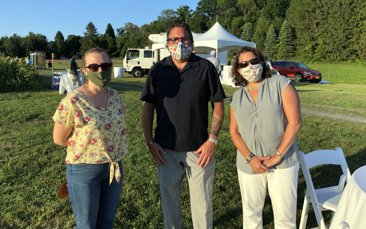 Anne Ebersman and Barbara Glassman flank Jonathan&nbsp; Cetnarski, the Center&#39;s executive director