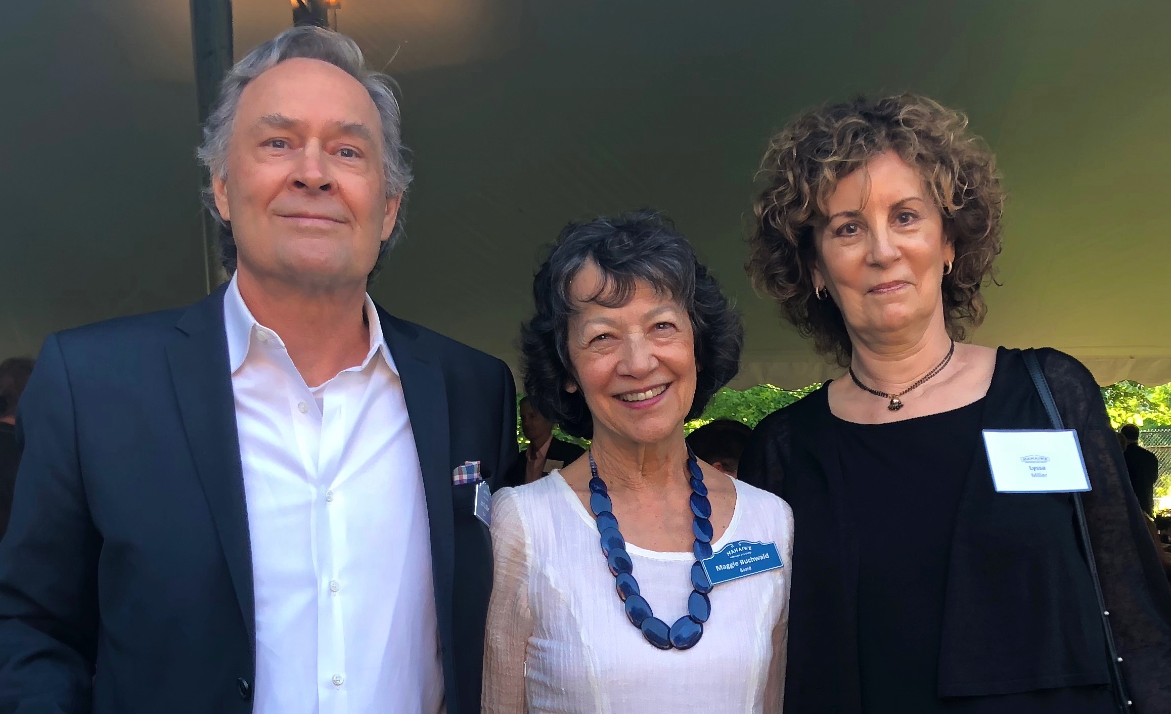 Board member John D. Miller, board chair Maggie Buchwald and Lyssa Miller