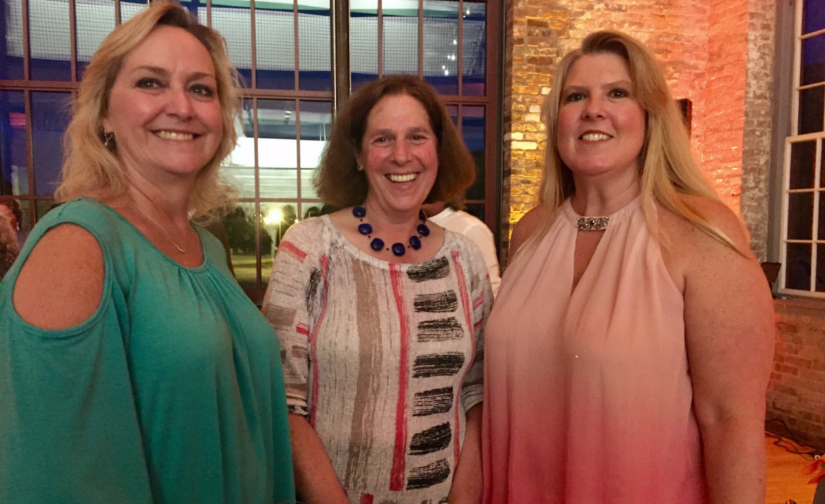 Nancy Maier is flanked by Pamela Walker and Crystal Collins, both from Atlanta and involved with Consenses through their organization, ArtsNow.