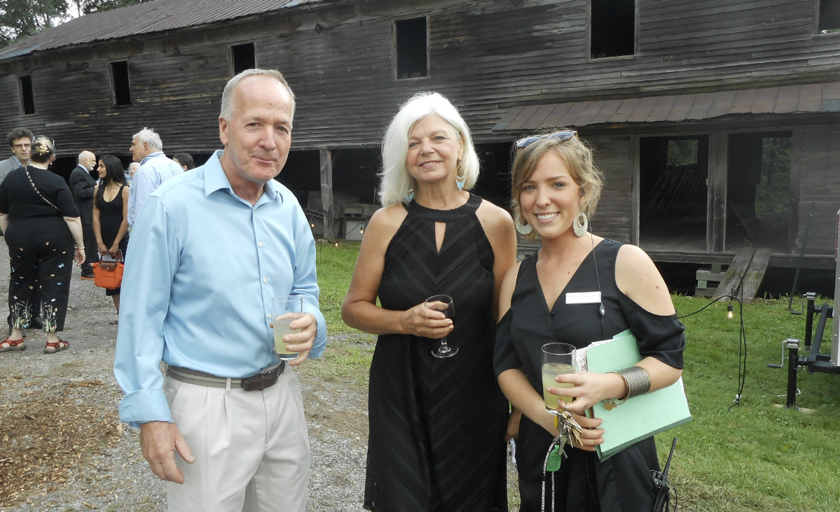 Mike Hursa, Linda Hursa, owner of Angels Trumpet Florist, and Shawna Fitzsimmons, director of operations.