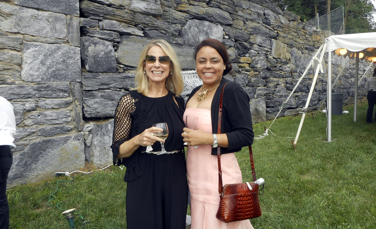 Margaret Sullivan and Sheila Aleixo-Cramer; both work at Taconic Engineering.