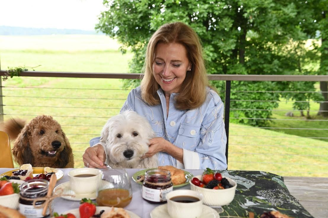 Silda Wall Spitzer with Tuck the goldendoodle and Sam the sheepdog. Silda Wall Spitzer with Tuck the goldendoodle and Sam the sheepdog.
