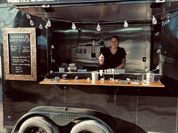 Megan Kitsock, at home behind the ice cream counter of Supreme Soft Serve